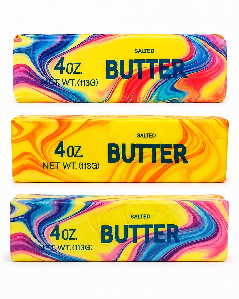 a 4oz butter-stick inspired squishy with a marbled design, salted butter label, soft squeezable texture, and clear individual packaging in colors from top to bottom rainbow swirl (red), citrus swirl (orange), and cotton candy swirl (pink)