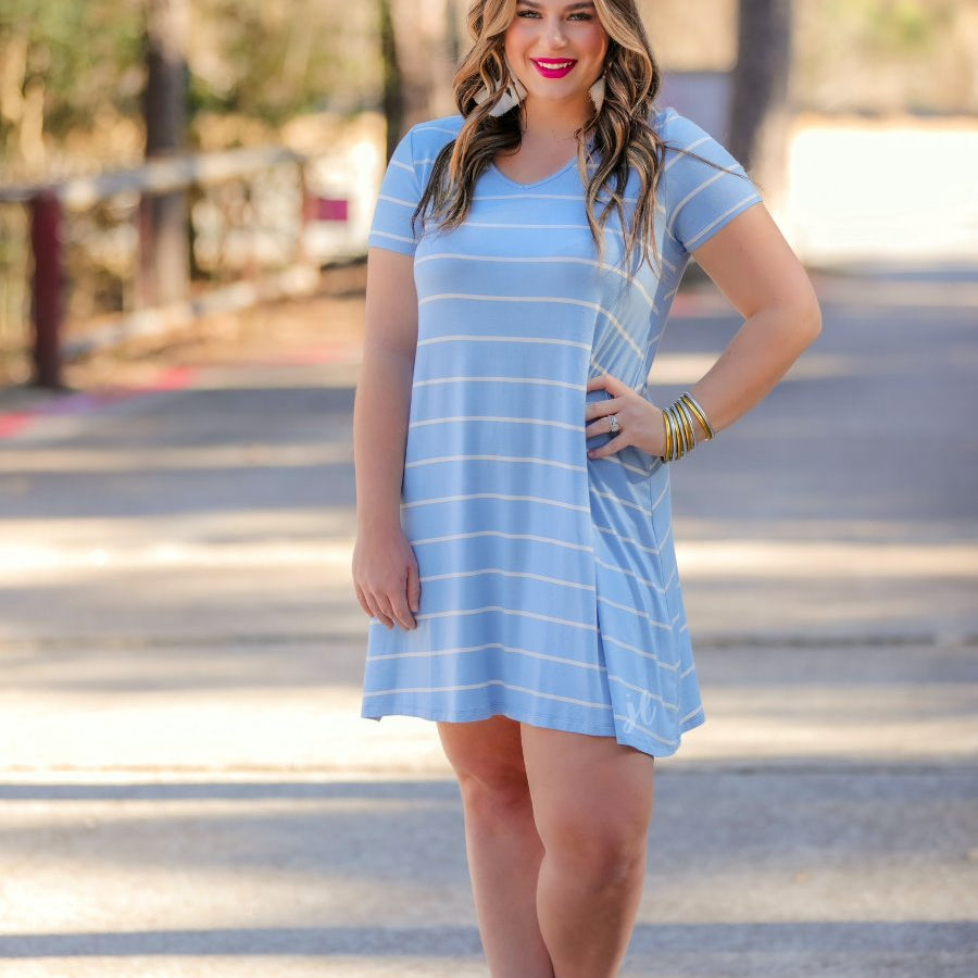 short-sleeve A-line dress with a V-neckline, crafted from ultra-soft fabric in a solid color with horizontal white stripes and a straight hemline in chambray