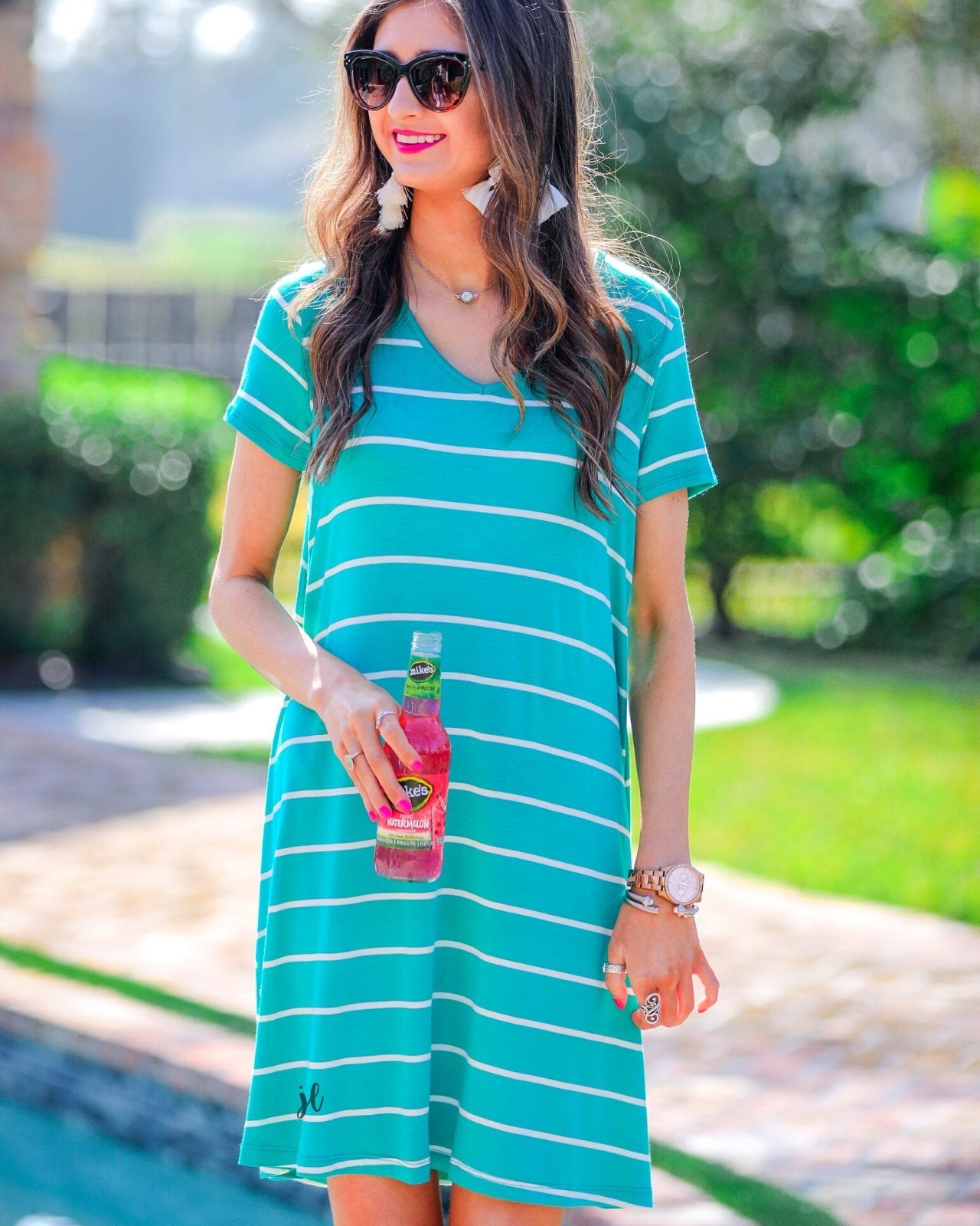 short-sleeve A-line dress with a V-neckline, crafted from ultra-soft fabric in a solid color with horizontal white stripes and a straight hemline in mint