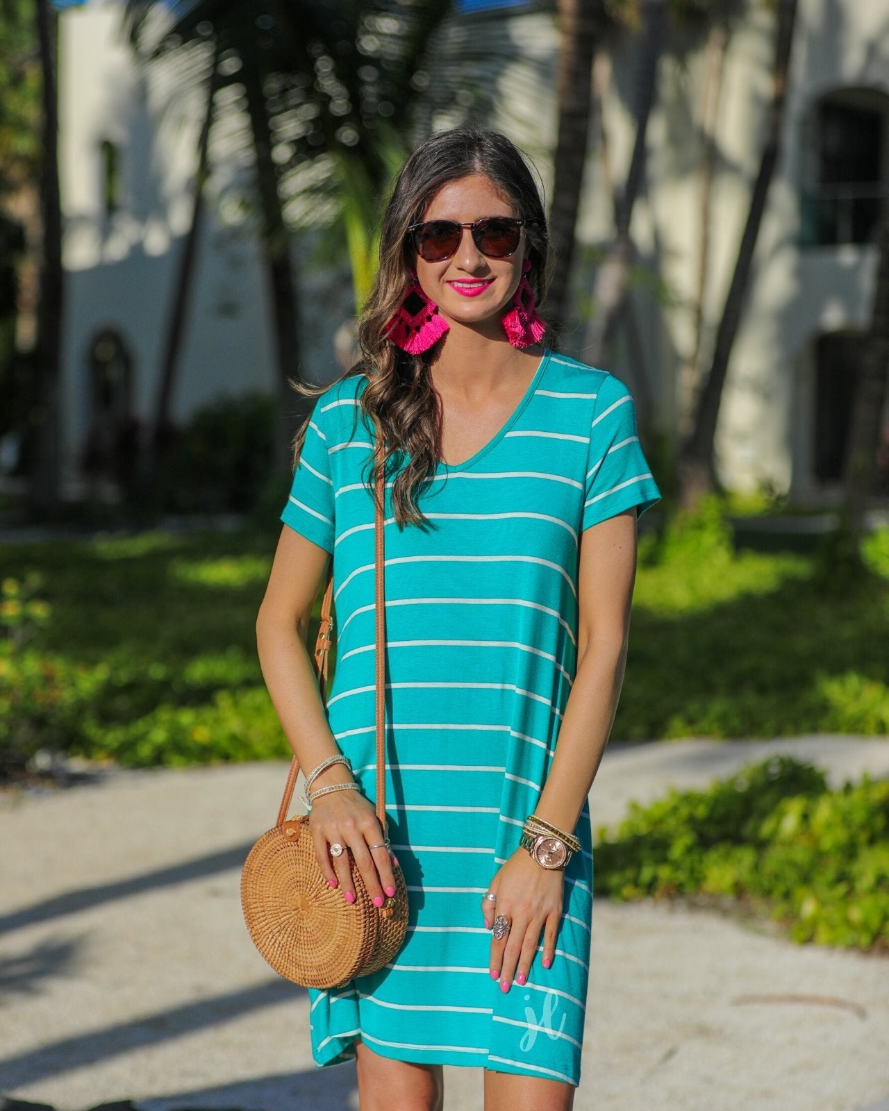 short-sleeve A-line dress with a V-neckline, crafted from ultra-soft fabric in a solid color with horizontal white stripes and a straight hemline in mint