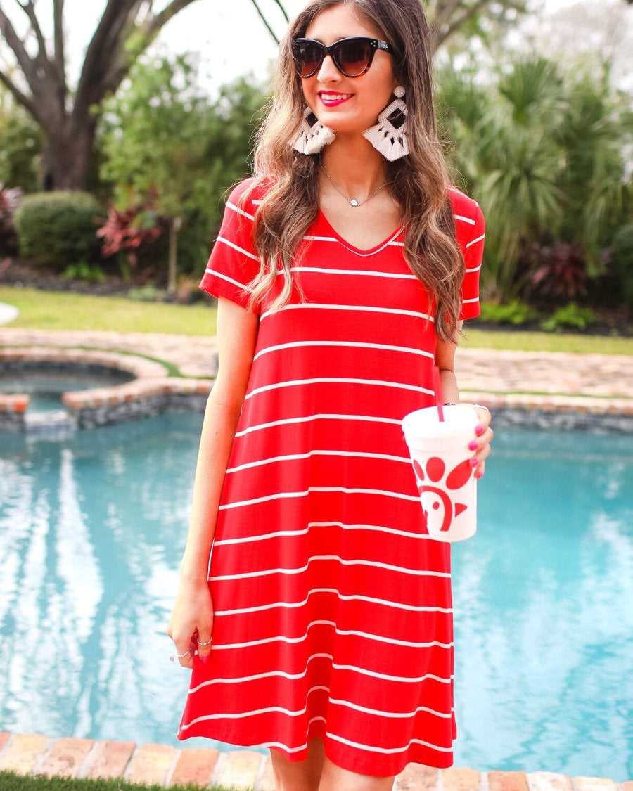 short-sleeve A-line dress with a V-neckline, crafted from ultra-soft fabric in a solid color with horizontal white stripes and a straight hemline in red