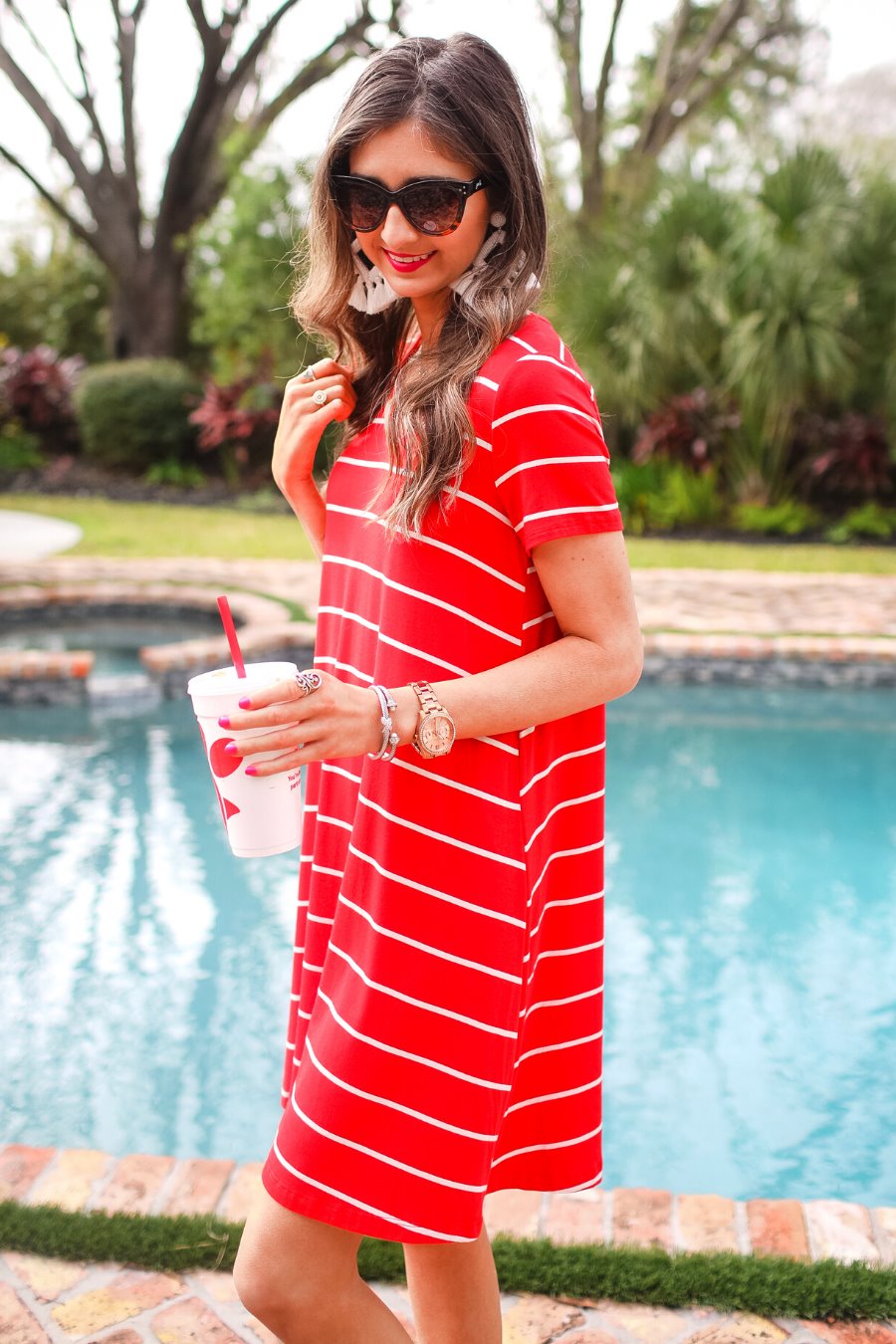 short-sleeve A-line dress with a V-neckline, crafted from ultra-soft fabric in a solid color with horizontal white stripes and a straight hemline in red