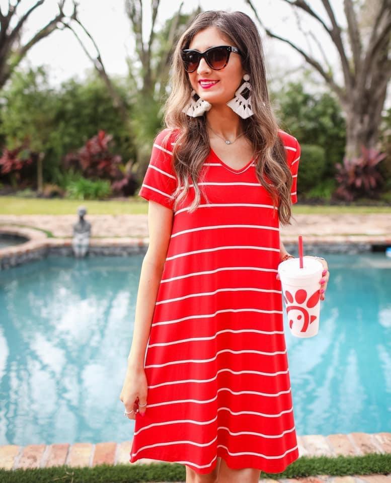 short-sleeve A-line dress with a V-neckline, crafted from ultra-soft fabric in a solid color with horizontal white stripes and a straight hemline in red