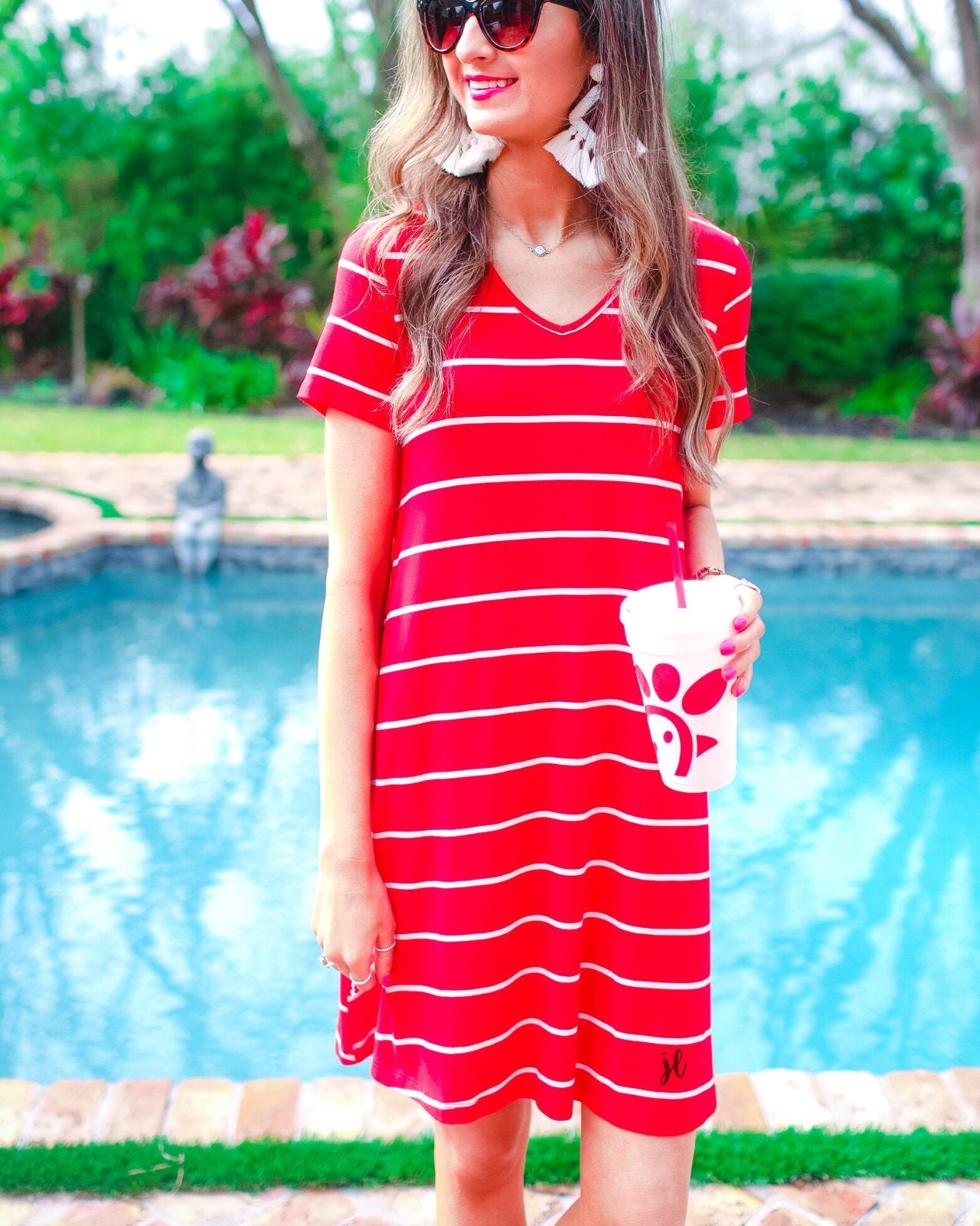short-sleeve A-line dress with a V-neckline, crafted from ultra-soft fabric in a solid color with horizontal white stripes and a straight hemline in red