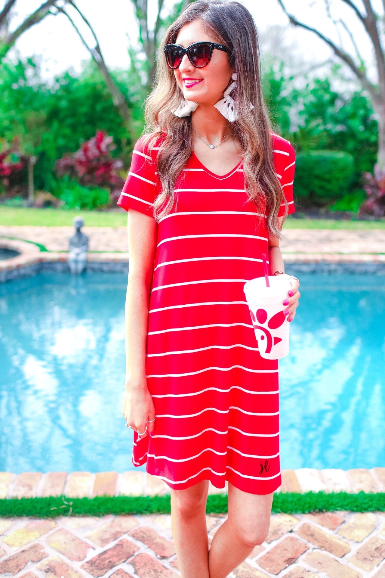 short-sleeve A-line dress with a V-neckline, crafted from ultra-soft fabric in a solid color with horizontal white stripes and a straight hemline in red