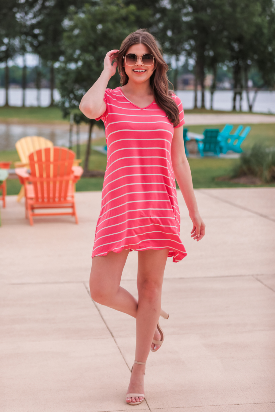 short-sleeve A-line dress with a V-neckline, crafted from ultra-soft fabric in a solid color with horizontal white stripes and a straight hemline in salmon