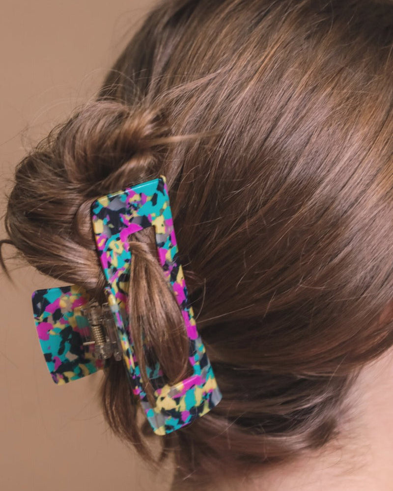 marble acrylic claw clip with a gentle grip that reduces breakage while providing a secure hold in multi