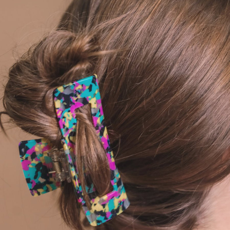 marble acrylic claw clip with a gentle grip that reduces breakage while providing a secure hold in multi