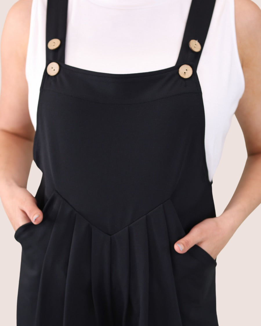 solid black overall shorts made from our best-selling everyday fabric with functional button straps, cuffed hems, and side pockets
