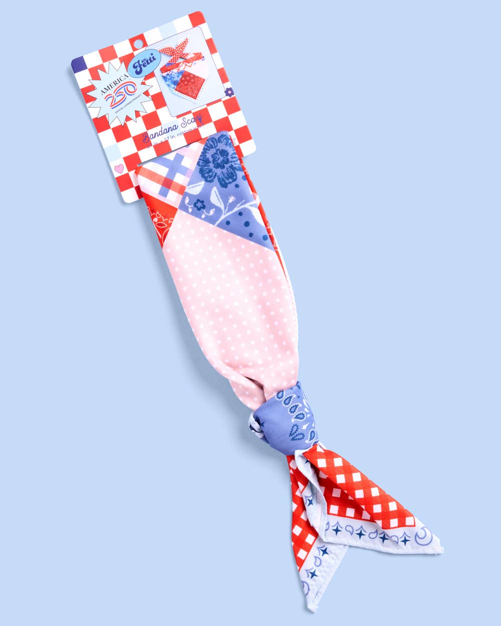 a soft silky polyester scarf with a red, white, and blue quilt-inspired print, finished with a blend of floral, gingham, and paisley details