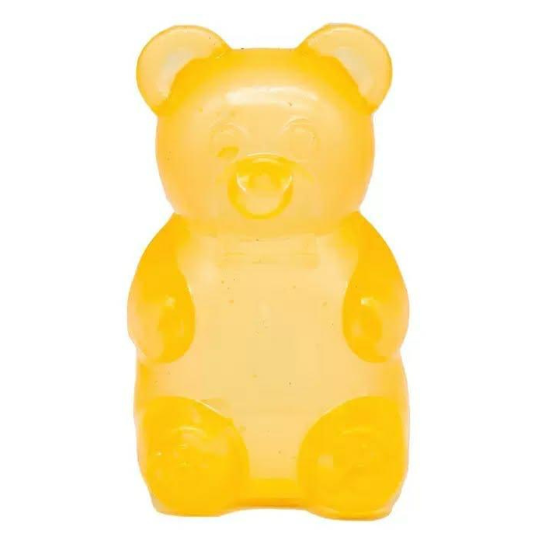 a yellow jumbo gummy bear squishes with a super soft slow-rising feel, and a bright translucent color