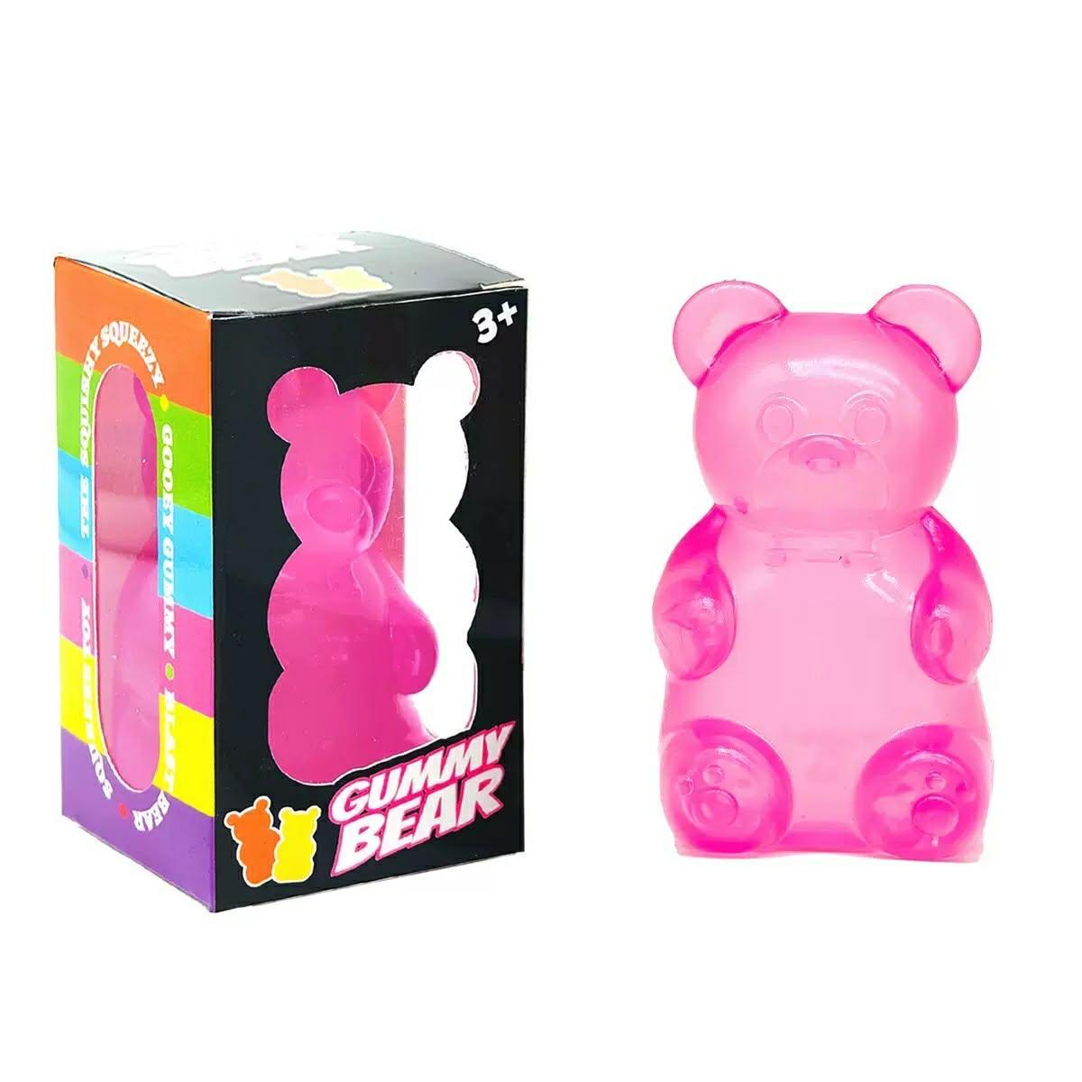 a pink jumbo gummy bear squishes with a super soft slow-rising feel, and a bright translucent color