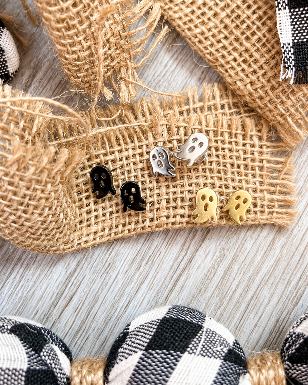 lightweight stainless steel, gold-plated post-stud earrings with shiny mirror-image ghost silhouettes, matching barrel earring backs, and nickel/lead compliant construction in black, gold, and silver