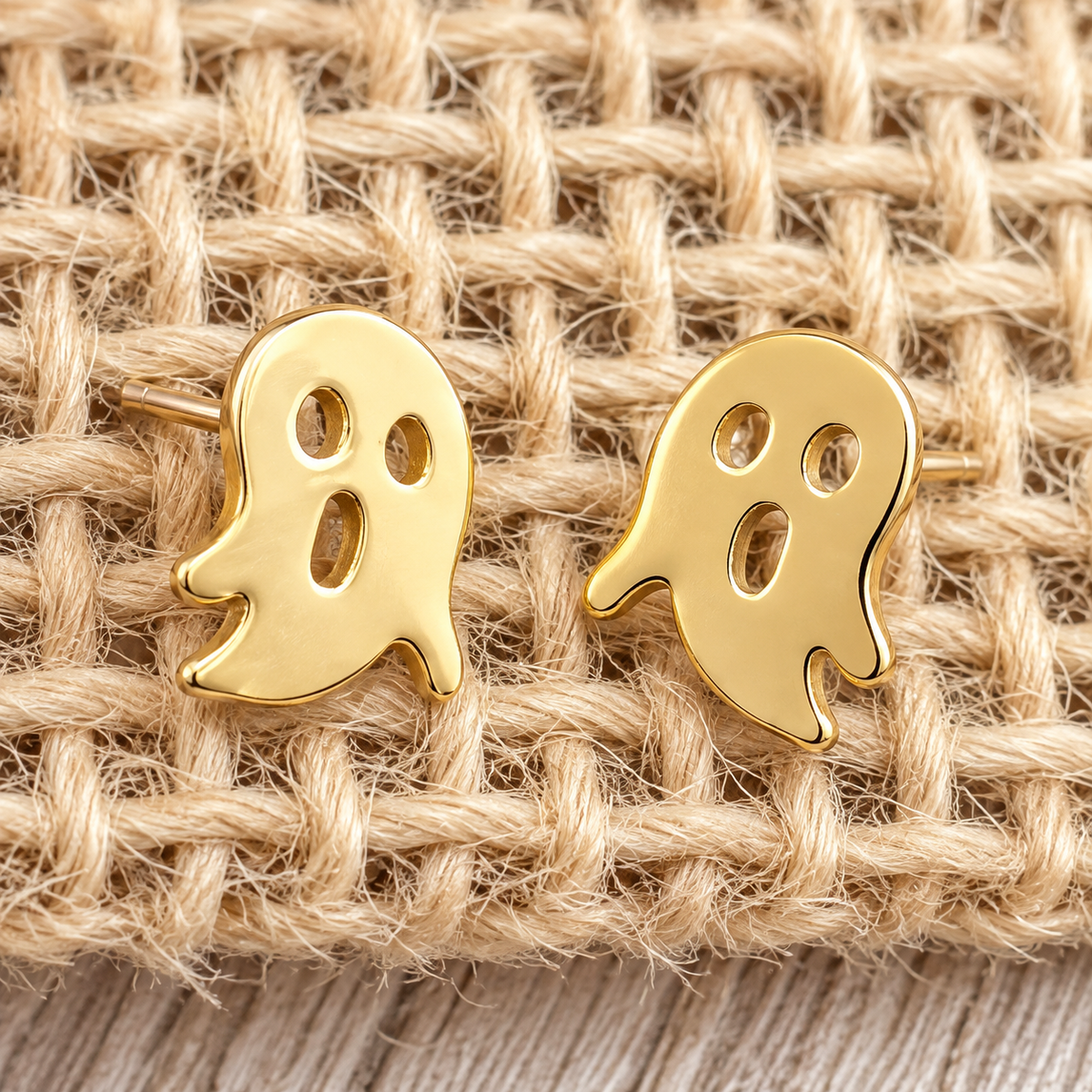 lightweight gold stainless steel, gold-plated post-stud earrings with shiny mirror-image ghost silhouettes, matching barrel earring backs, and nickel/lead compliant construction
