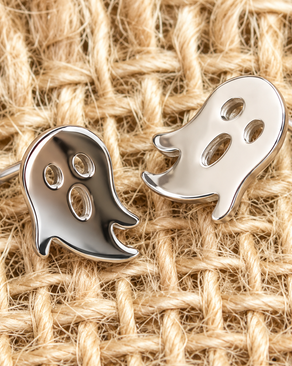 lightweight gold stainless steel, gold-plated post-stud earrings with shiny mirror-image ghost silhouettes, matching barrel earring backs, and nickel/lead compliant construction