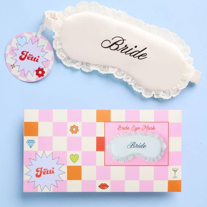 Bride eye mask with packaging on a blue background