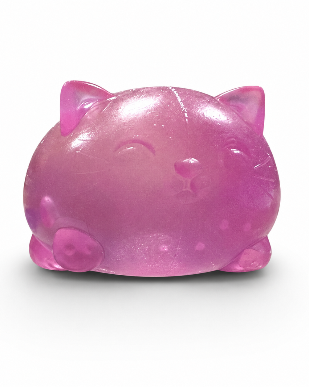 a soft purple jelly-like chubby kitty squishy with closed eyes, a super slow-rising texture, a stretchy squeezable feel, and a bright translucent color