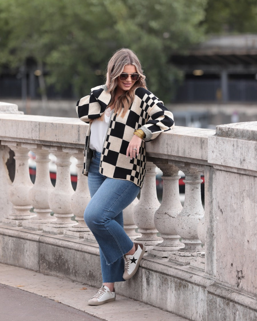long-sleeve open front cardigan with balloon sleeves and a checkered pattern in tan/black