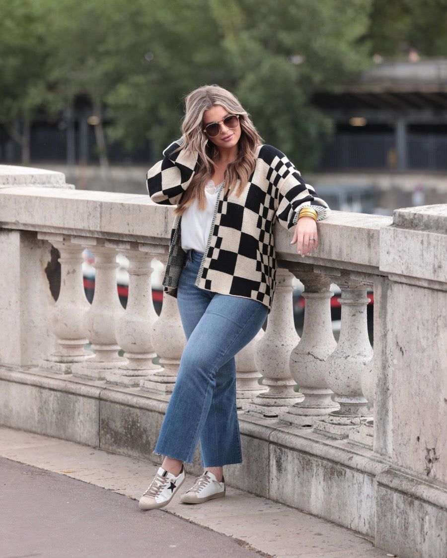 long-sleeve open front cardigan with balloon sleeves and a checkered pattern in tan/black