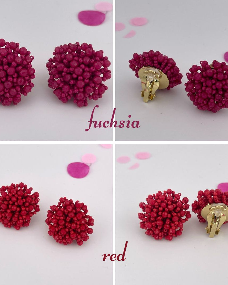 mix of size beads in a pom shape with a clip-on closure