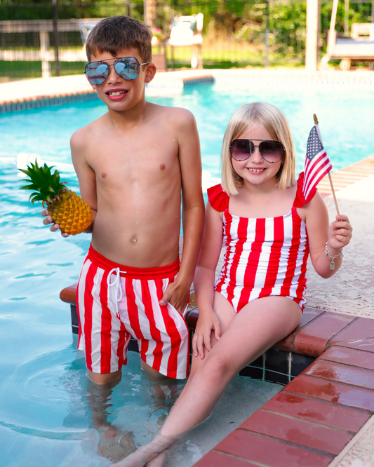 red and white striped swimsuit trunks for boys and one-piece for girls