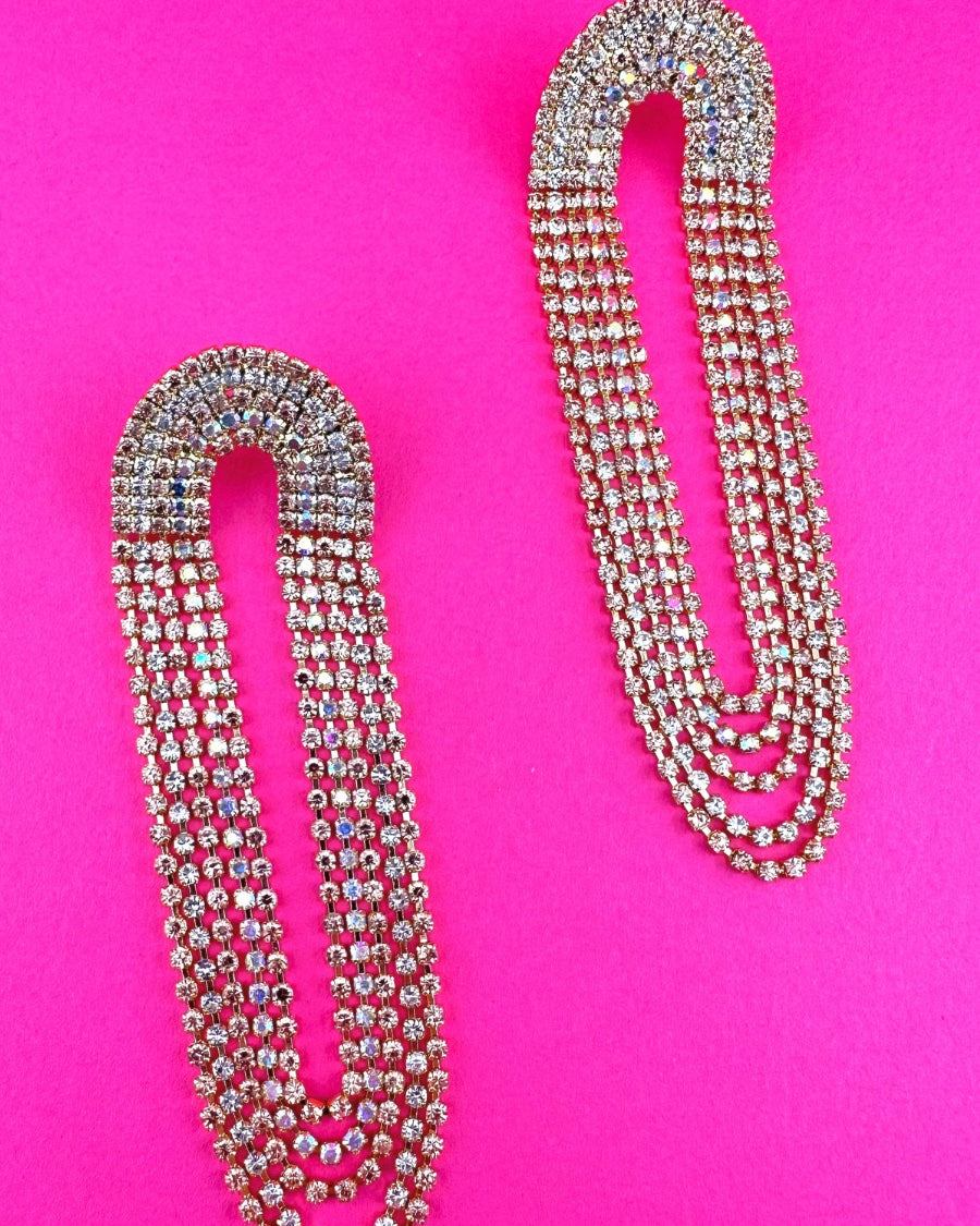 gold-plated rose gold, silver, and iridescent rhinestone stud earrings with a comfort back earring and a plastic disc stopper in gold