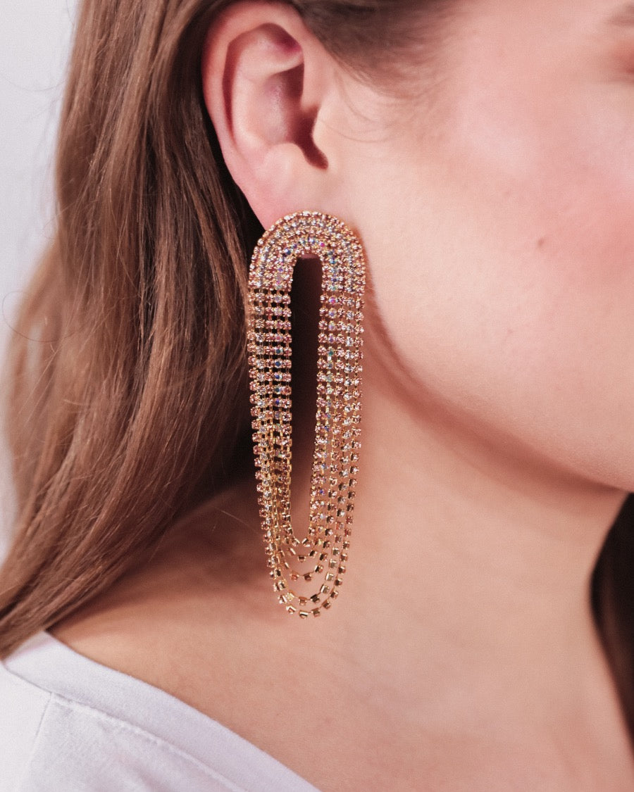 gold-plated rose gold, silver, and iridescent rhinestone stud earrings with a comfort back earring and a plastic disc stopper in gold