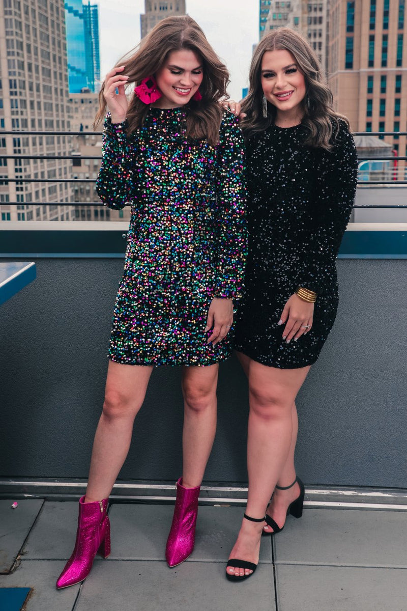 a long-sleeve dress with shimmering allover sequins detailing, a flattering silhouette, a soft-lined interior, and a back zipper that extends two-thirds down for a polished, easy fit in black and multi