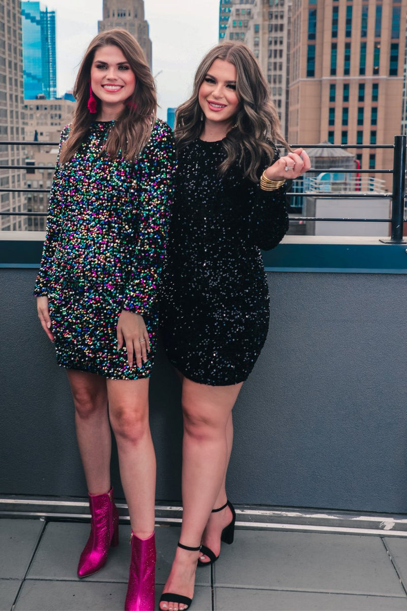 a long-sleeve dress with shimmering allover sequins detailing, a flattering silhouette, a soft-lined interior, and a back zipper that extends two-thirds down for a polished, easy fit in black and multi