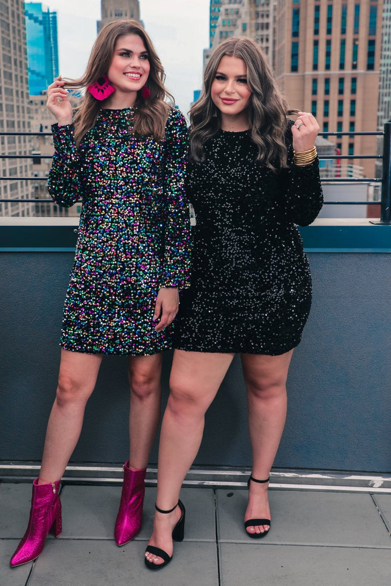 a long-sleeve dress with shimmering allover sequins detailing, a flattering silhouette, a soft-lined interior, and a back zipper that extends two-thirds down for a polished, easy fit in black and multi