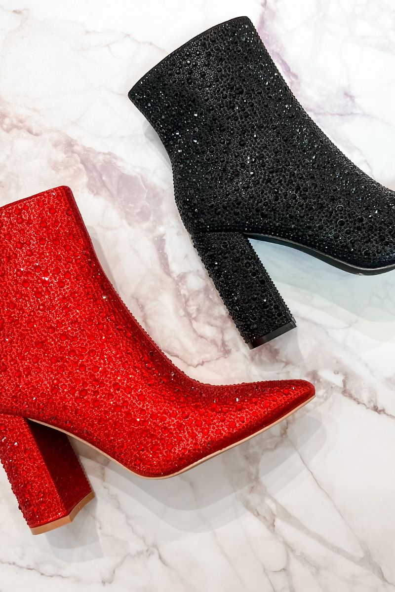rhinestone-covered booties with a pointed toe, front seam, inside zipper, cushioned flatbed, and a 4" block heel in red and black