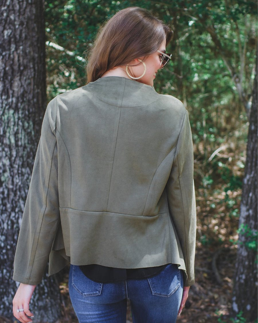 draped open-front silhouette jacket, crafted on a super soft faux suede material with long sleeves, an angled front cropped hem, and subtle seam details on the back in olive