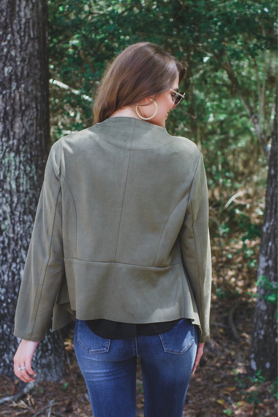 draped open-front silhouette jacket, crafted on a super soft faux suede material with long sleeves, an angled front cropped hem, and subtle seam details on the back in olive