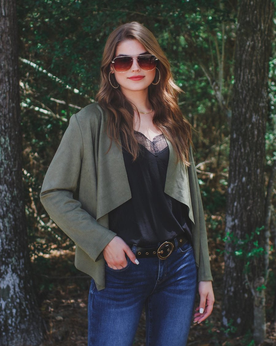 draped open-front silhouette jacket, crafted on a super soft faux suede material with long sleeves, an angled front cropped hem, and subtle seam details on the back in olive