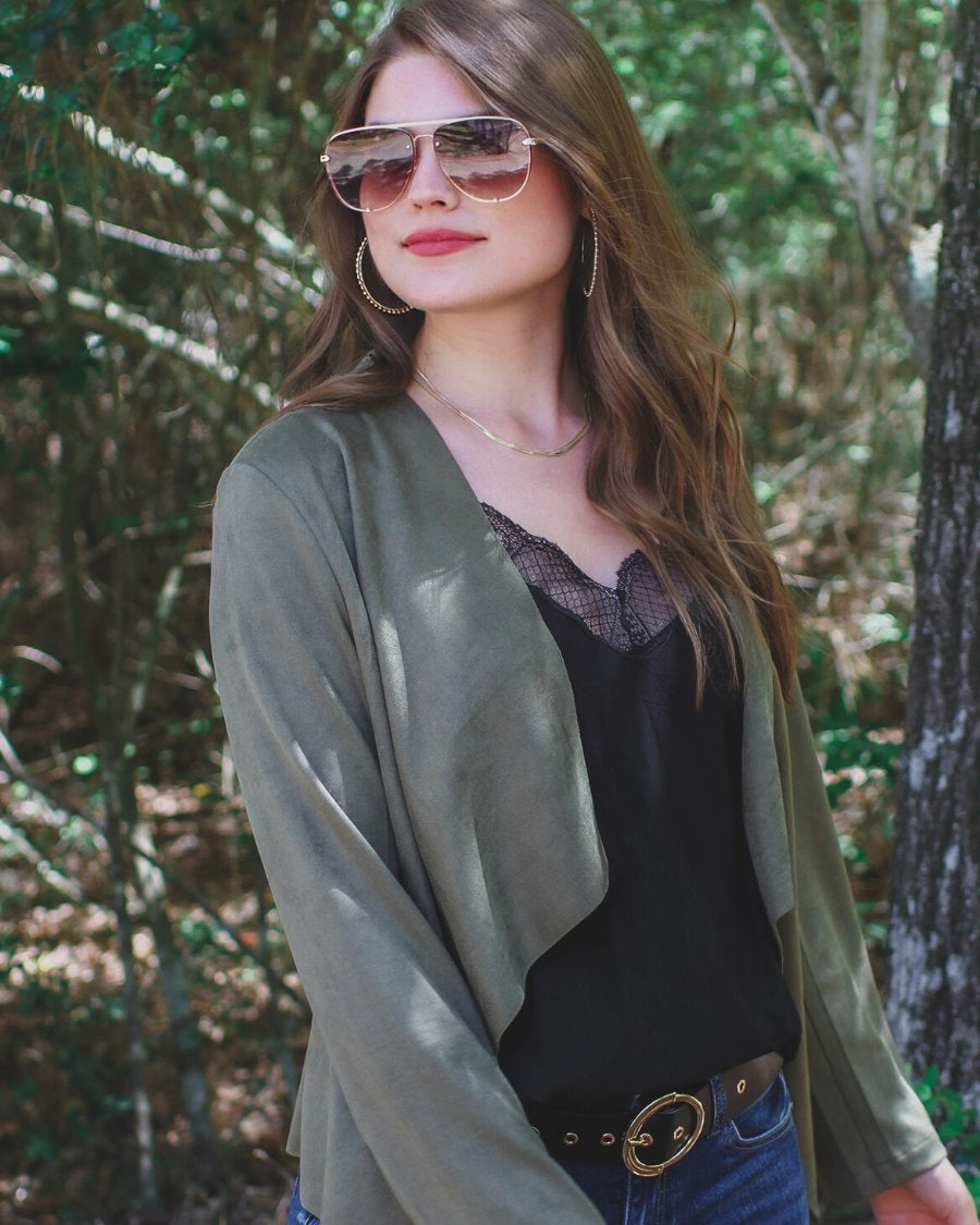 draped open-front silhouette jacket, crafted on a super soft faux suede material with long sleeves, an angled front cropped hem, and subtle seam details on the back in olive