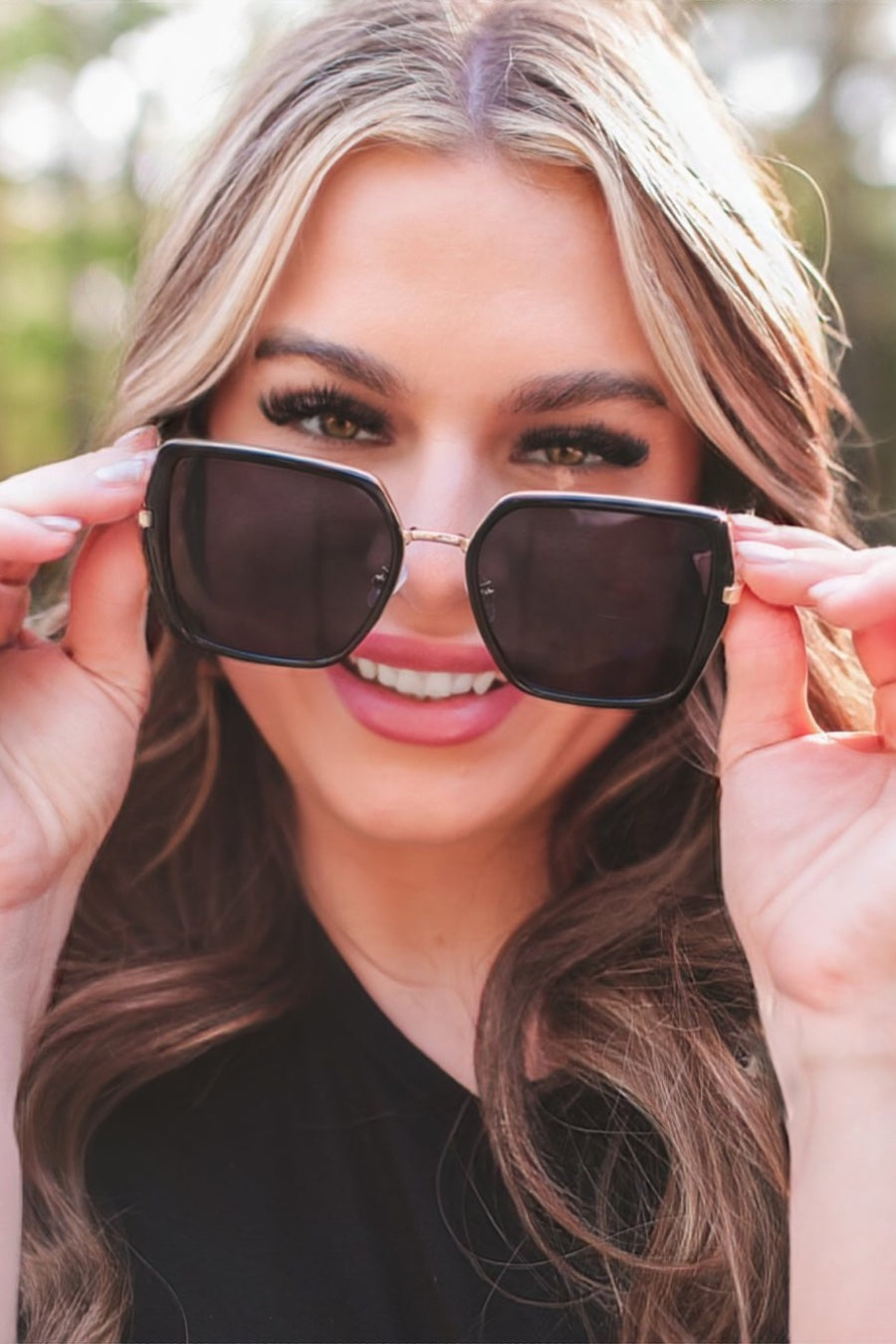 black square frame sunglasses with gold bridge, nose pads, UV protection, and brand name detail (on both the temple and the complimentary black pouch)