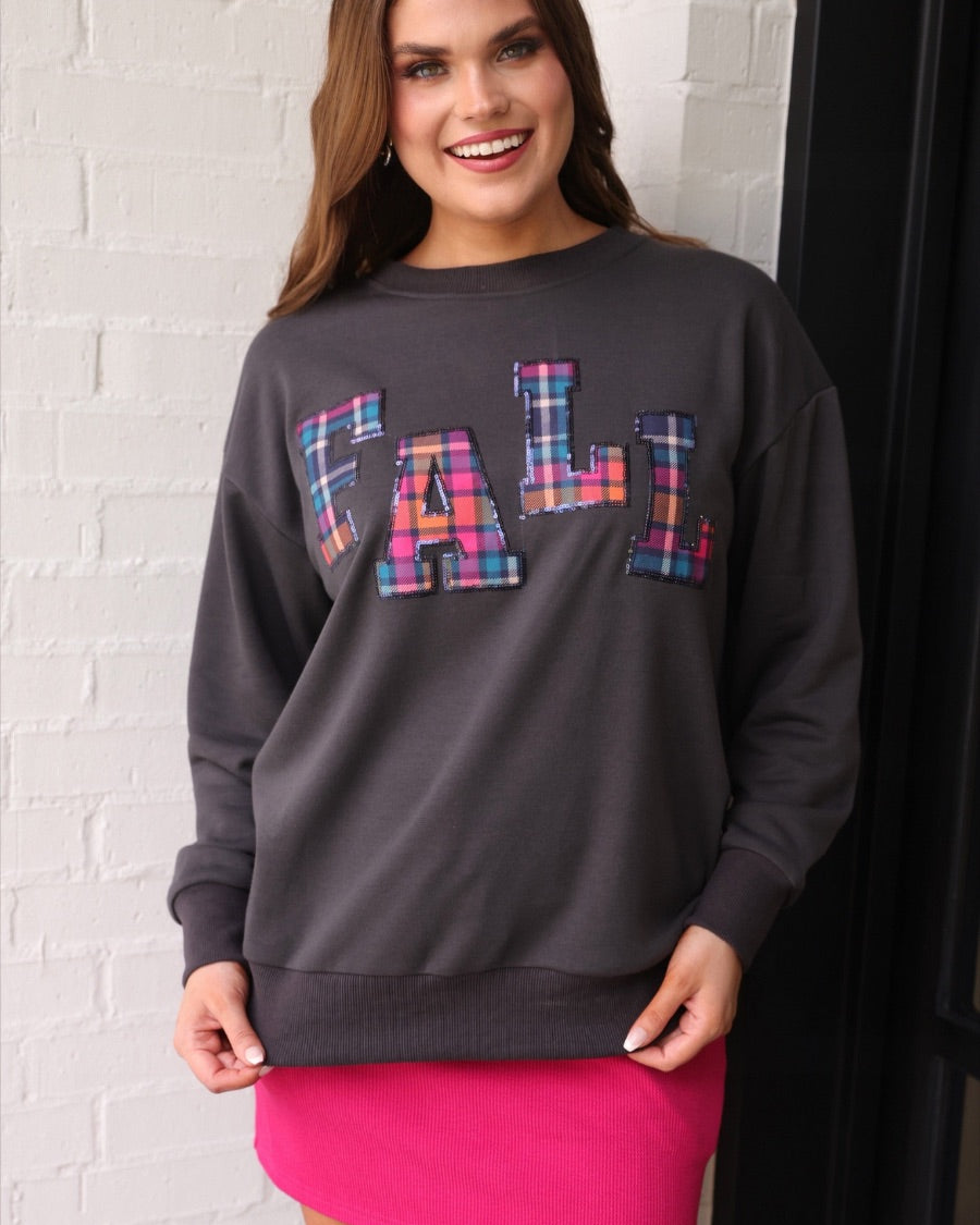 long-sleeve gray pullover with plaid 'FALL' letters in our exclusive Patterned In Plaid print, each outlined in sequins on a soft, cozy fabric