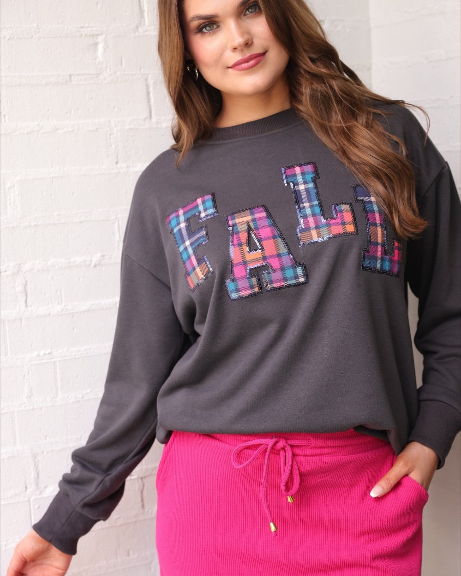long-sleeve gray pullover with plaid 'FALL' letters in our exclusive Patterned In Plaid print, each outlined in sequins on a soft, cozy fabric