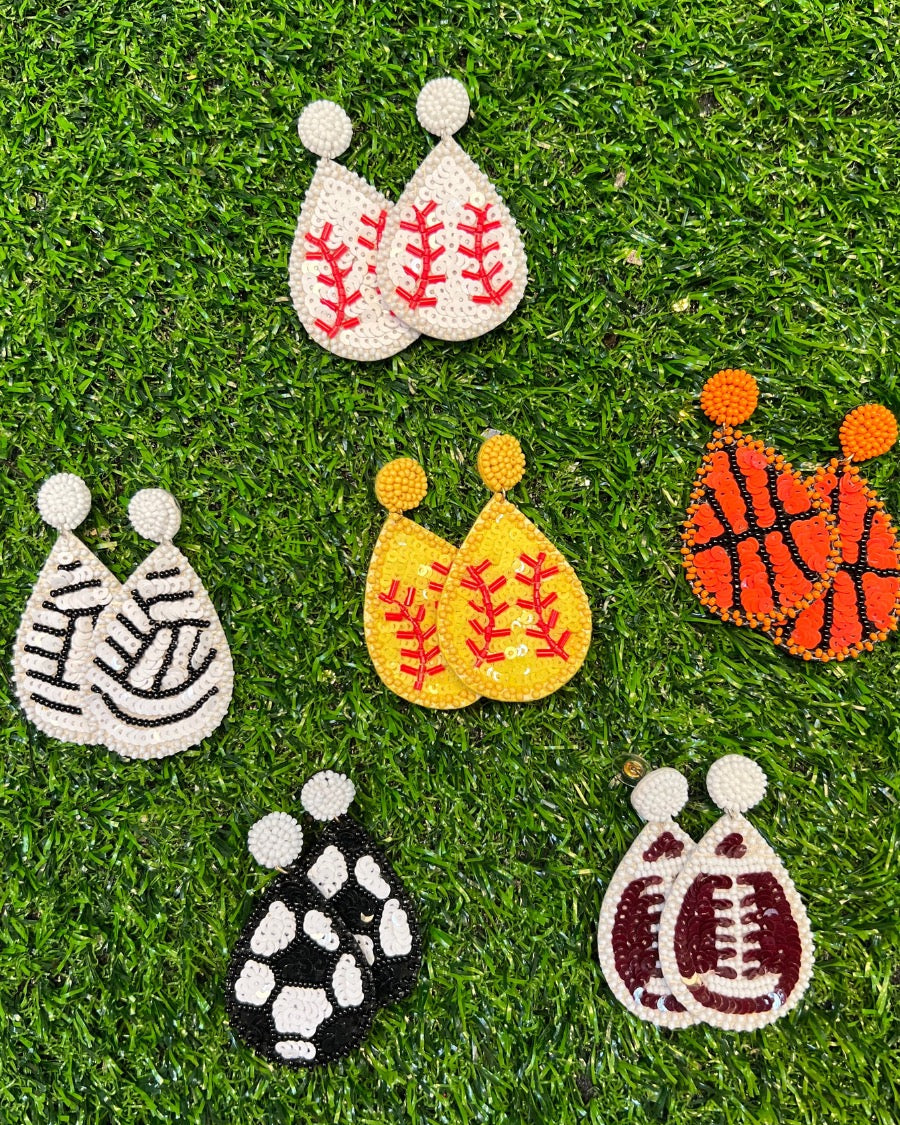 lightweight, sports-inspired beaded teardrop-shaped earrings with a felt backing, a comfort back, and a plastic disc stopper in gold that's nickel and lead compliant in baseball (white), basketball (orange), football (brown), soccer (black), softball (yellow), and volleyball (white)