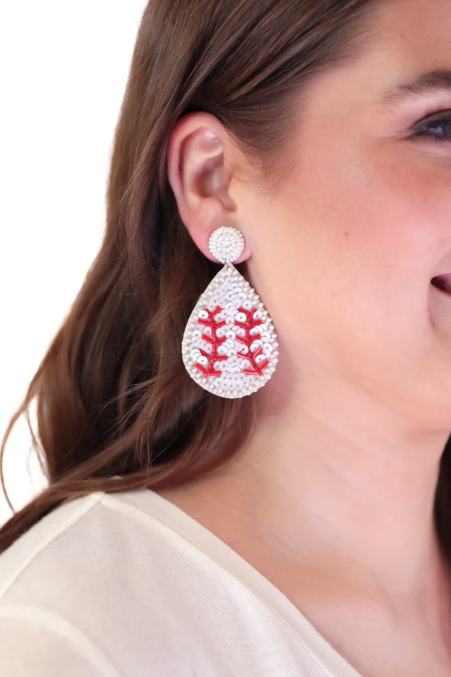 lightweight, sports-inspired beaded teardrop-shaped earrings with a felt backing, a comfort back, and a plastic disc stopper in gold that's nickel and lead compliant in baseball (white)