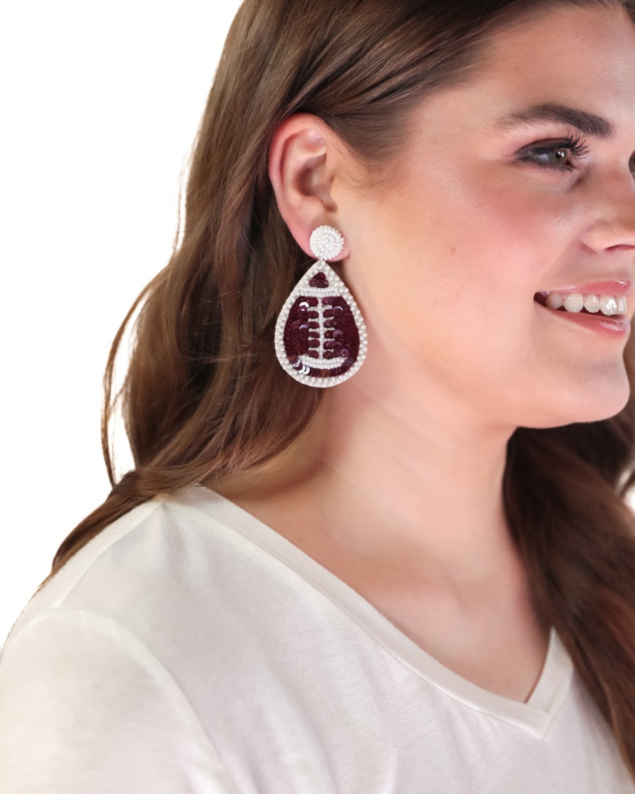 lightweight, sports-inspired beaded teardrop-shaped earrings with a felt backing, a comfort back, and a plastic disc stopper in gold that's nickel and lead compliant in football (brown)