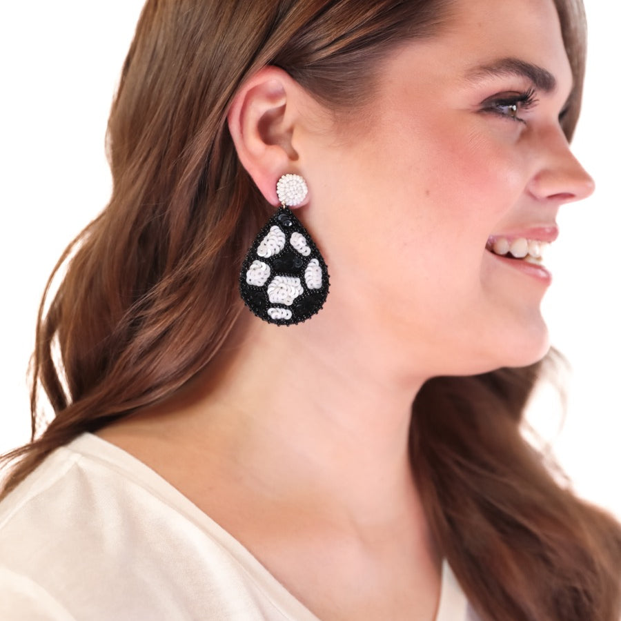 lightweight, sports-inspired beaded teardrop-shaped earrings with a felt backing, a comfort back, and a plastic disc stopper in gold that's nickel and lead compliant in soccer (black)
