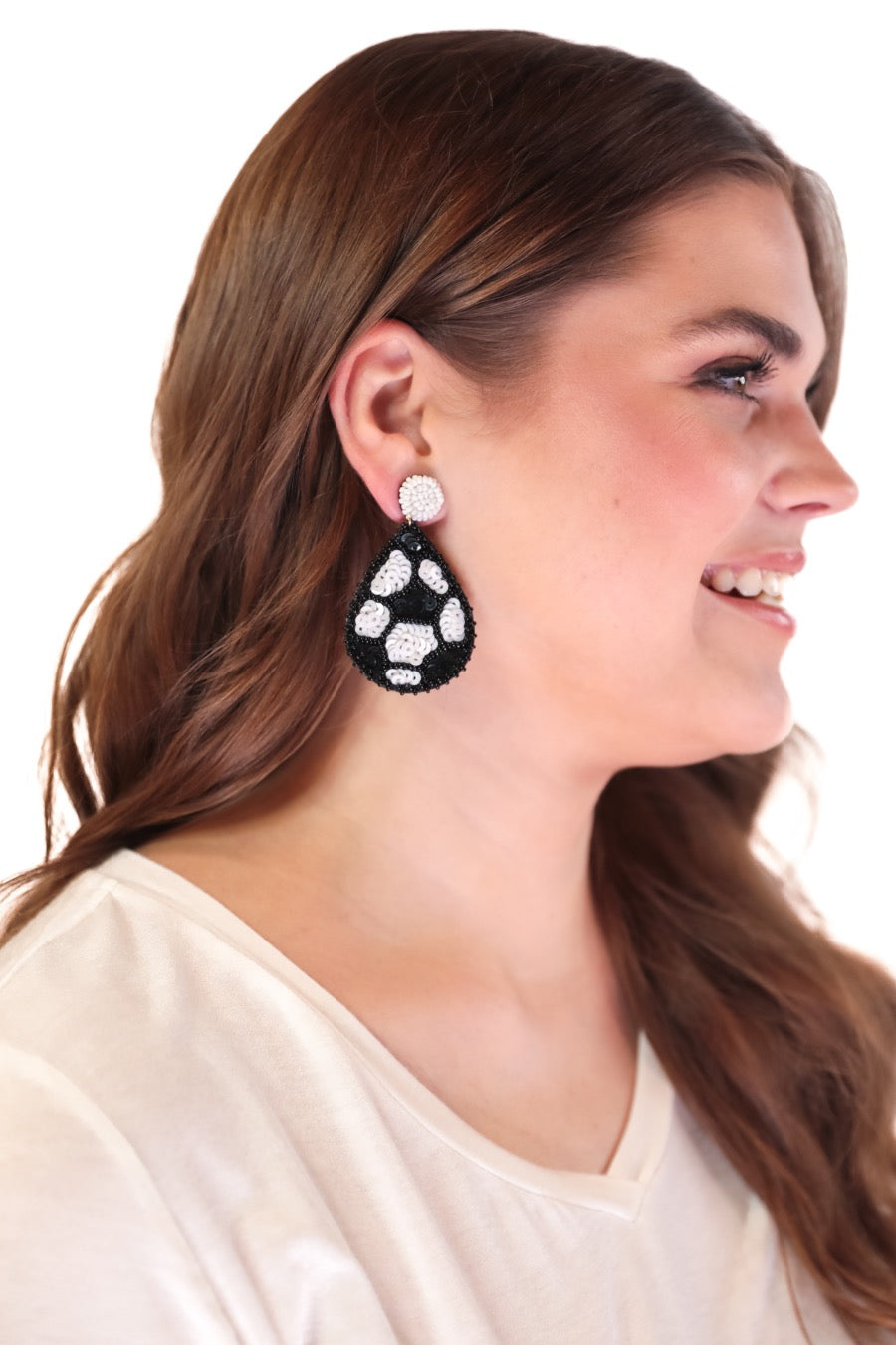 lightweight, sports-inspired beaded teardrop-shaped earrings with a felt backing, a comfort back, and a plastic disc stopper in gold that's nickel and lead compliant in soccer (black)