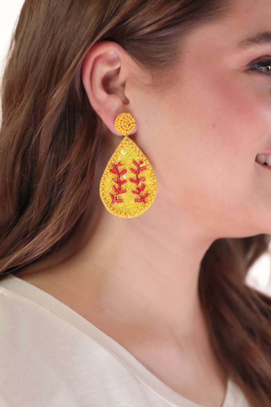 lightweight, sports-inspired beaded teardrop-shaped earrings with a felt backing, a comfort back, and a plastic disc stopper in gold that's nickel and lead compliant in softball (yellow)