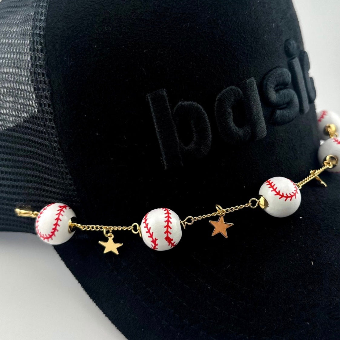 baseball hat chain with a golden star accent
