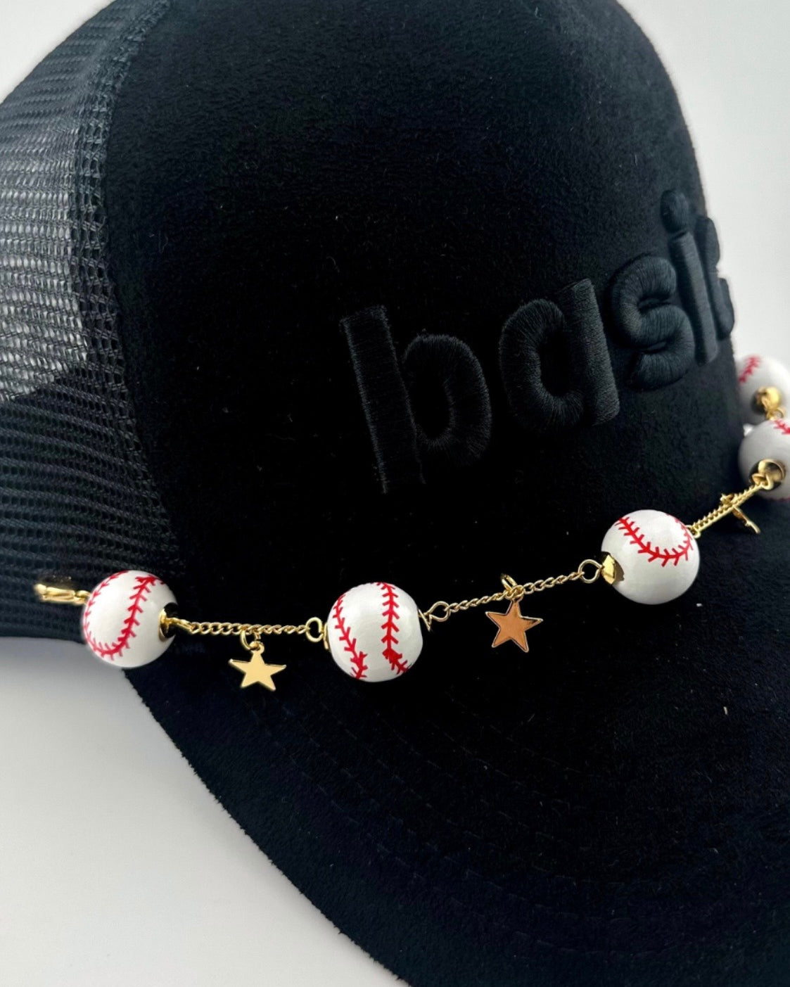 baseball hat chain with a golden star accent