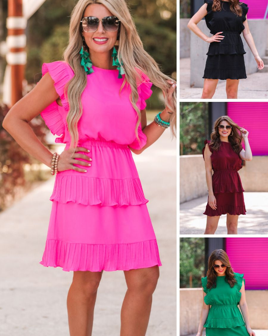 ruffled sleeve dress with layered pleats, an elastic waistband, and a lined bottom in black, burgundy, green, and pink