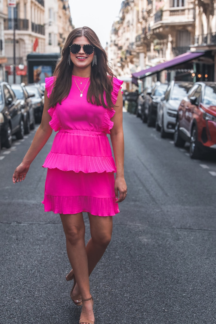 ruffled sleeve dress with layered pleats, an elastic waistband, and a lined bottom in pink