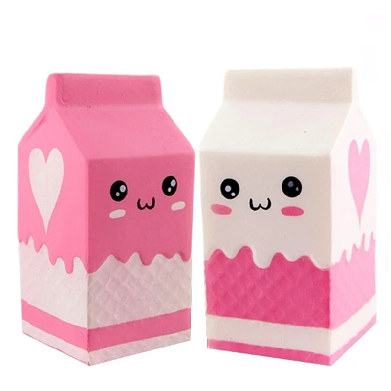 a milk-carton squishy with a kawaii face, pink-and-white colorblock design, textured accent panel, side heart detail, squeezable sensory feel, and individual packaging in pink and white