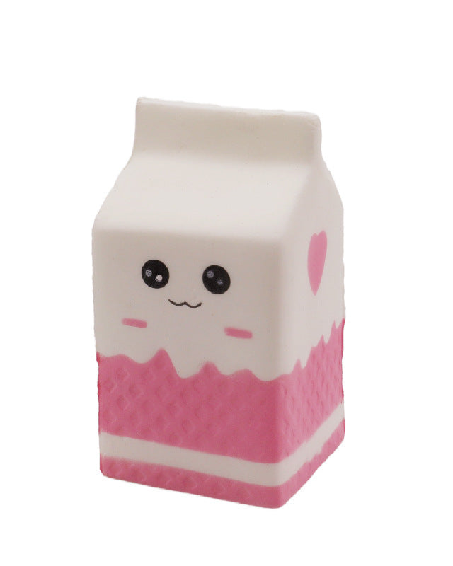 a white milk-carton squishy with a kawaii face, pink-and-white colorblock design, textured accent panel, side heart detail, squeezable sensory feel, and clear individual packaging